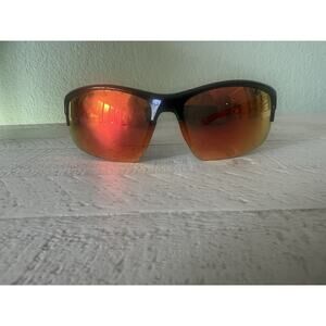 Piranha sport sunglasses with red and black temples